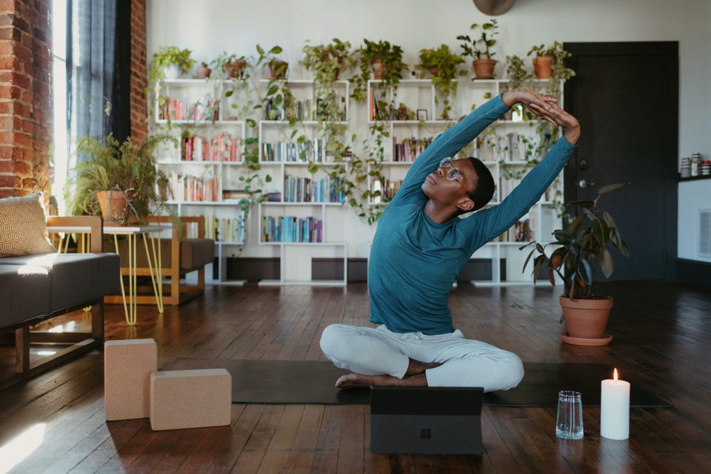a black man having yoga